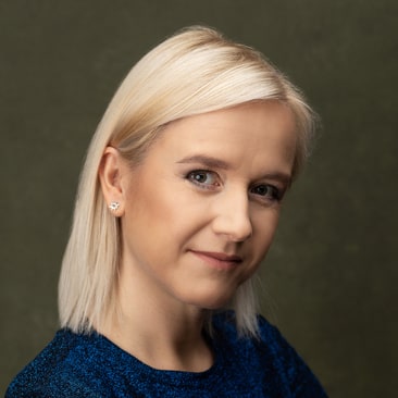 Anna Skopowska-Czołgosz zdjęcie portretowe młodej kobiety, z jasnymi włosami średniej długości